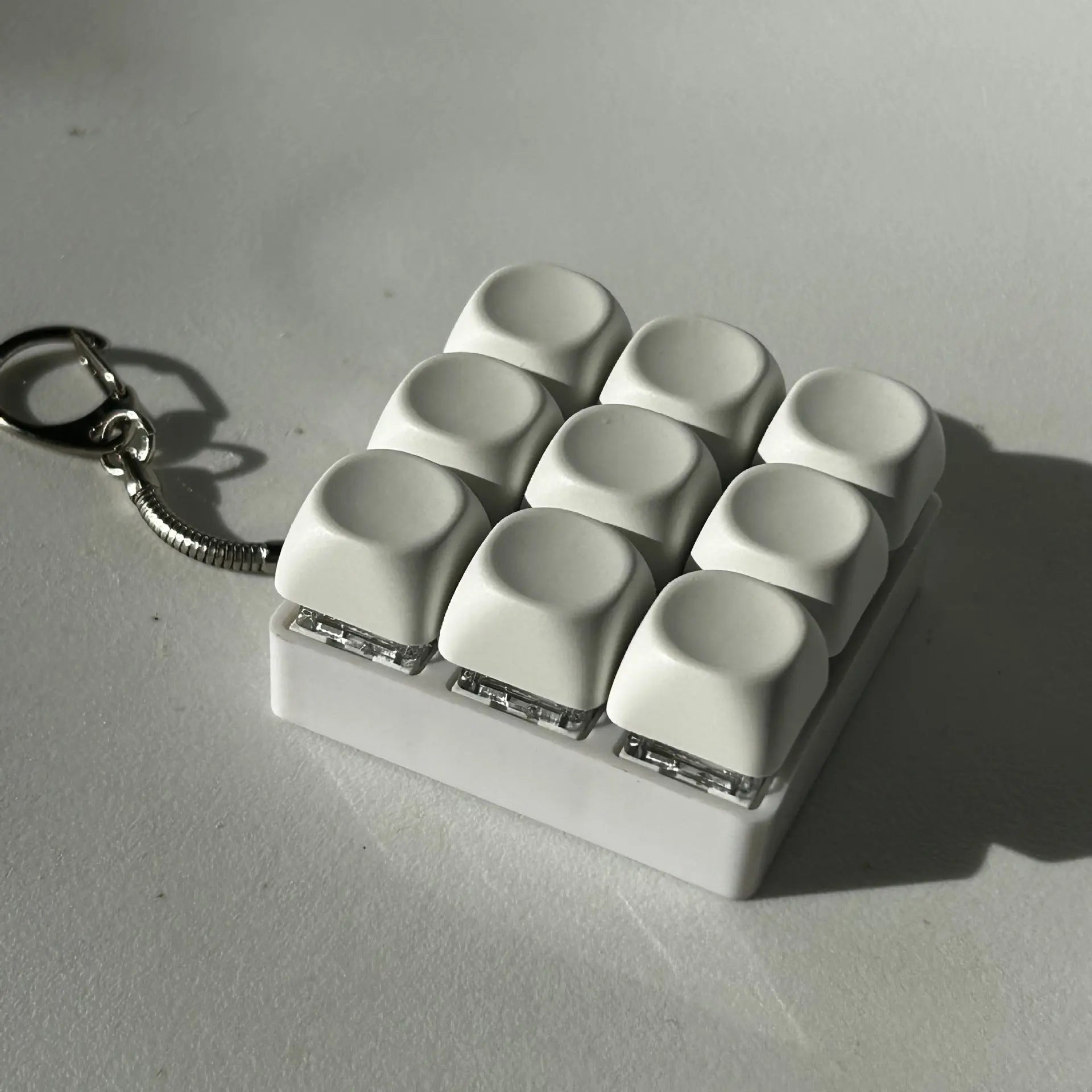 2-Pack White Mechanical 9-Keyboard Fingertip Toy Keychain - Key Pressure Relief, PVC Fingertip Toy Wholesale Hub