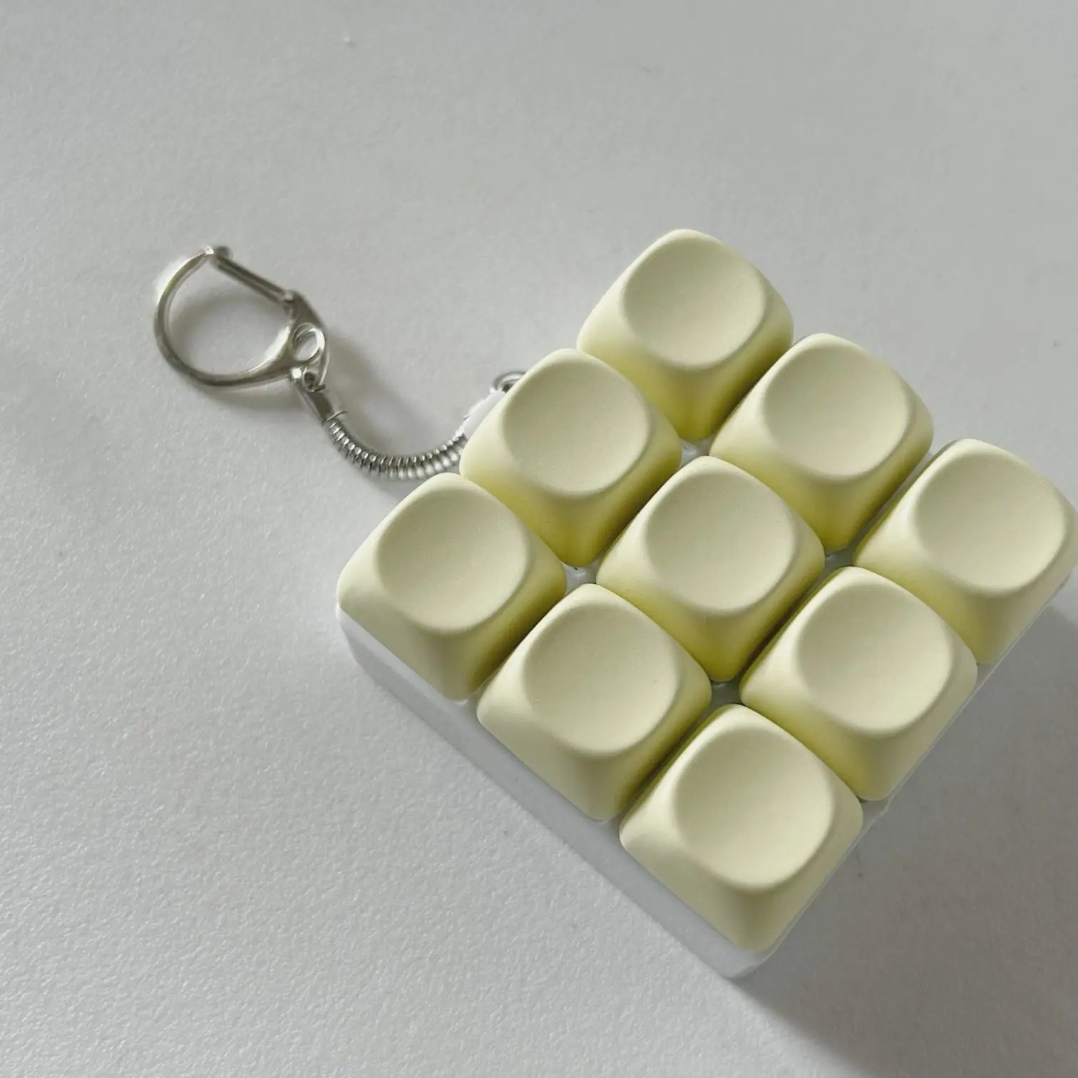 2-Pack Light Yellow Mechanical 9-Keyboard Fingertip Toy Keychain - Key Pressure Relief, PVC Fingertip Toy Wholesale Hub