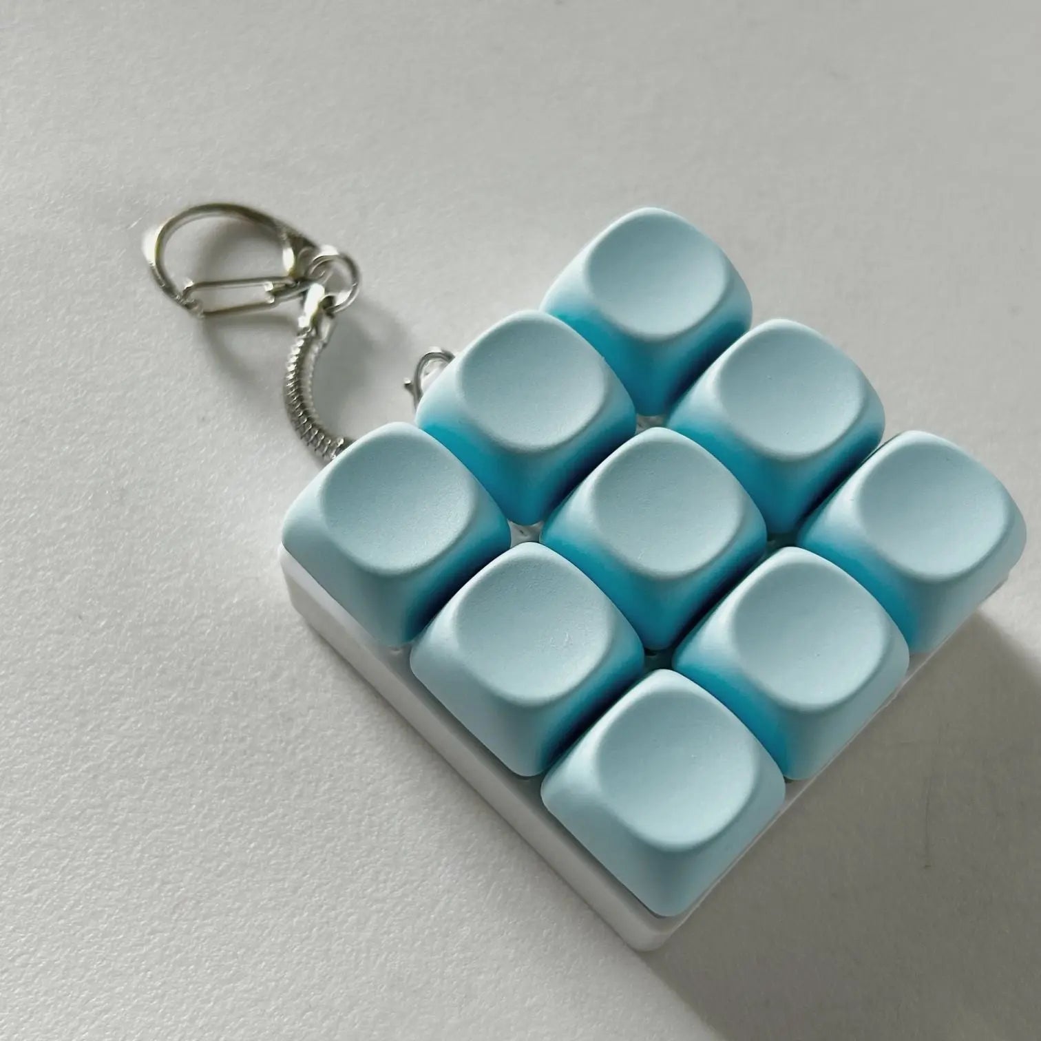 2-Pack Light Blue Mechanical 9-Keyboard Fingertip Toy Keychain - Key Pressure Relief, PVC Fingertip Toy Wholesale Hub