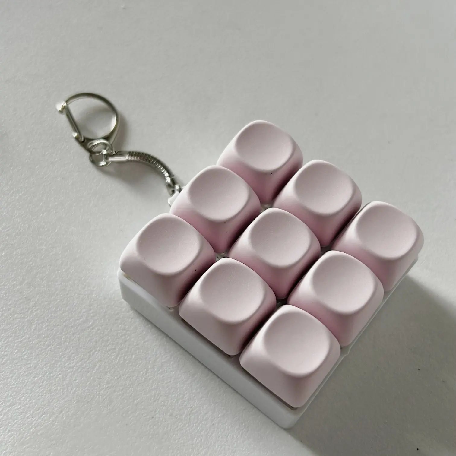 2-Pack Light Pink Mechanical 9-Keyboard Fingertip Toy Keychain - Key Pressure Relief, PVC Fingertip Toy Wholesale Hub