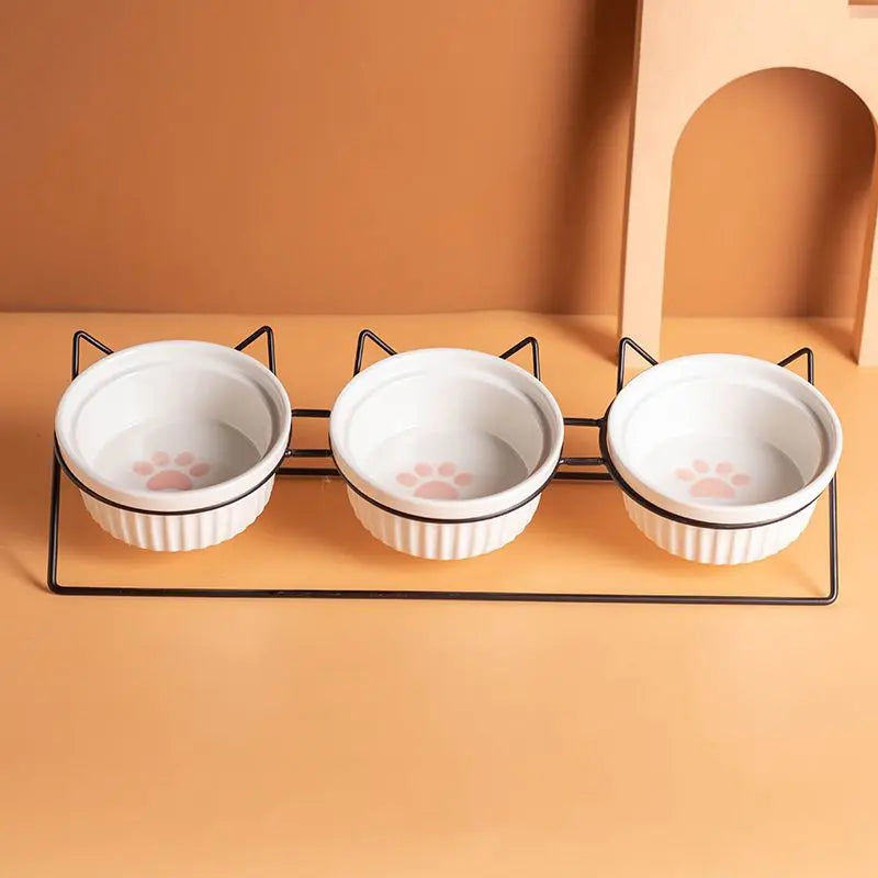 Triple Slanted Ceramic Pet Bowl Set with Elevated Iron Stand and Non Slip Base - 3 x 300ML Versatile Pink Cat Paw Print Pattern Dishes for Water & Food Wholesale Hub