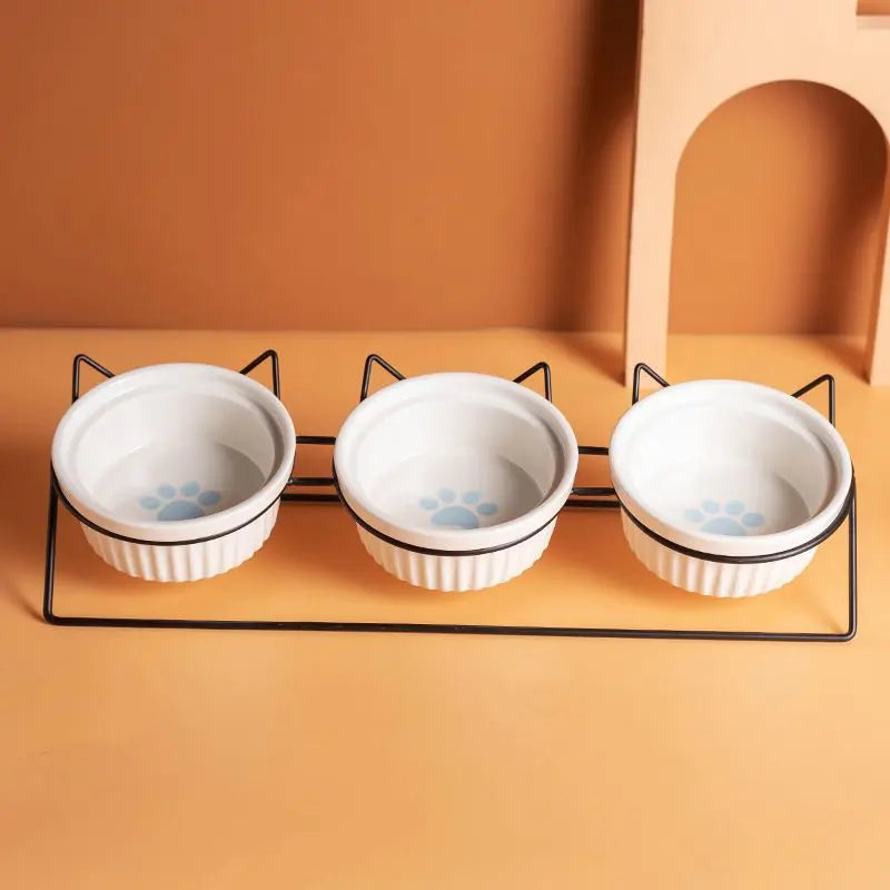 Triple Slanted Ceramic Pet Bowl Set with Elevated Iron Stand and Non Slip Base - 3 x 300ML Versatile Blue Cat Paw Print Pattern Dishes for Water & Food Wholesale Hub