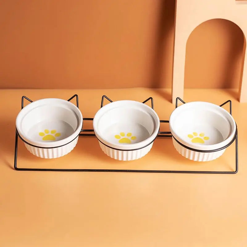 Triple Slanted Ceramic Pet Bowl Set with Elevated Iron Stand and Non Slip Base - 3 x 300ML Versatile Yellow Cat Paw Print Pattern Dishes for Water & Food Wholesale Hub